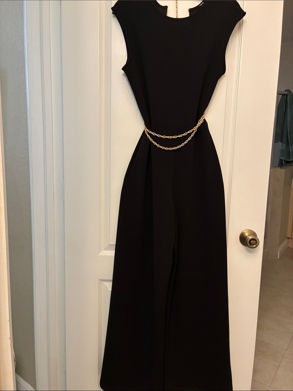 Express Elegant Black Sleeveless Jumpsuit with Gold Chain Detail